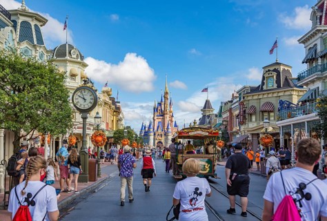 Horse pulling trolley car with Disney characters down Main Street in the Magic Kingdom at Walt