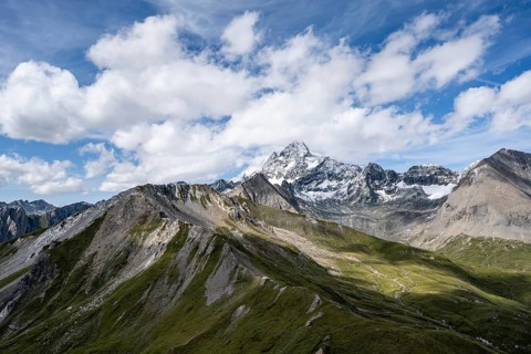 View of picturesque mountain landscape with snow-covered summit of the Großglockner, Wiener