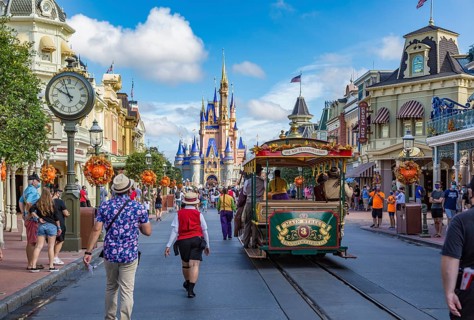 Horse pulling trolley car with Disney characters down Main Street in the Magic Kingdom at Walt