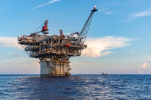 Private fishing boats near offshore petroleum drilling rig in the Gulf of Mexico