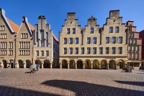 Old town, historical buildings, facade, window, gable, arcades, cobblestone street, pedestrians as