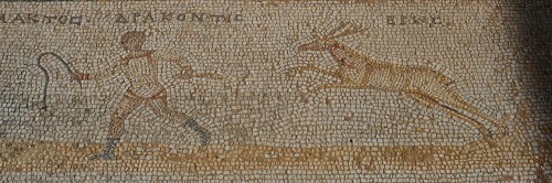 Ancient mosaic with a hunting scene of a man and a gazelle, Archaeological Site, Western