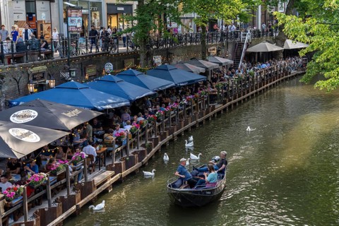 The old town centre of Utrecht, Oudegracht, around 2 km long with many old houses, shops,