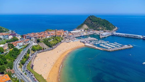 Aerial view of getaria, a charming coastal town in the basque country, spain, showcasing its