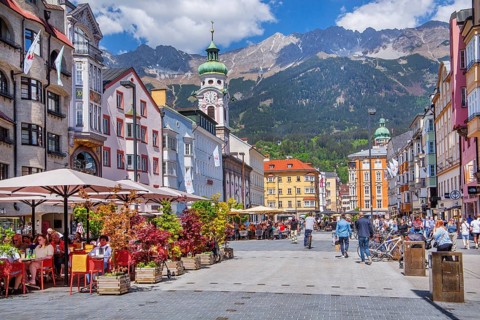 Street café on the pedestrian zone Maria-Theresien-Strasse in front of the Nordkette of the