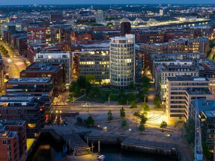 Aerial view of the Speicherstadt Hamburg with Magellan Terraces at Sandtor harbour at blue hour,