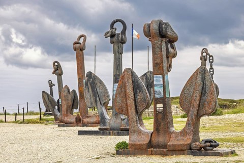 Old rusty anchor from warships by the Atlantic Battle Memorial Museum at Pointe de Pen Hir,