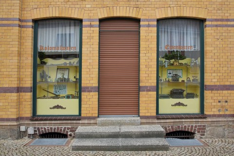 Shop window with colonial goods, shop, window, front door, Gräfenhainichen, Saxony-Anhalt, Germany,
