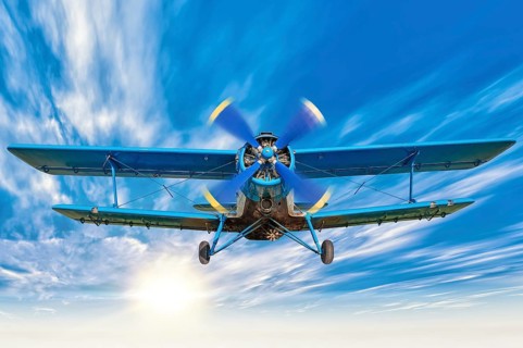 picture of a biplane in the sky