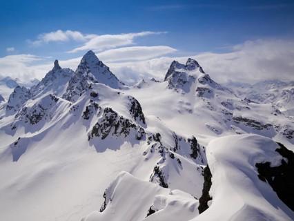 gorgeous mountain landscape in deep winter with impressive peaks in the Alps near Klosters in the