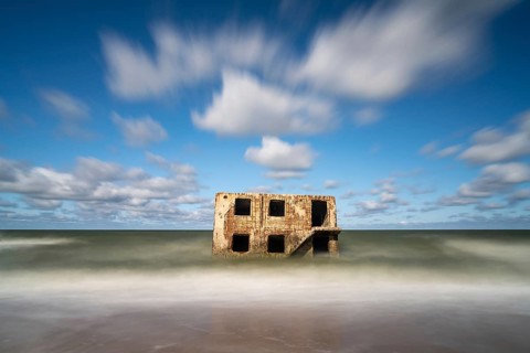Liepaja, Lithuania - 21 August, 2021: ruins of Karosta Fort military defenses in the Baltic Sea on