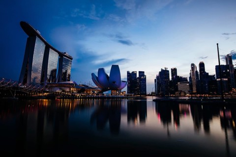 Marina Bay Sand area and Helix Bridge at dusk on a clear day on November 24th 2019