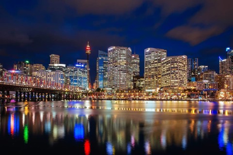 Sydney, Australia, October 14 2013: Sydney skyline and Pyrmont bridge at dusk near Darling Harbour,