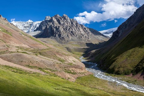 Amazing landscape of mountains, river and sky. Tien Shan, Kyrgyzstan, Asia