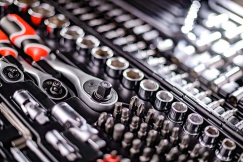 Composition with a variety of metal tools