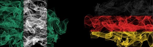 Flags of Nigeria and Germany on Black background, Nigeria vs Germany Smoke Flags