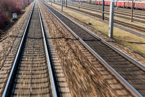 Austria, Upper Austria, Linz, Wels . Railway tracks seen from a moving train between Linz and Wels