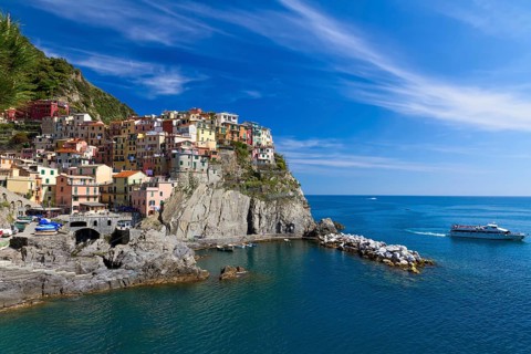 Village of Manarola with ferry, Cinque Terre, Italy, Europe