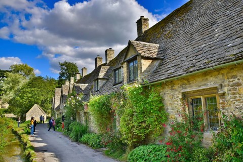Traditional rural houses in Bibury, a village in Cotswolds area, England, UK