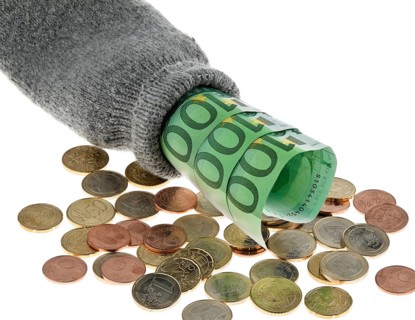A savings stocking with euro banknotes and euros Austria