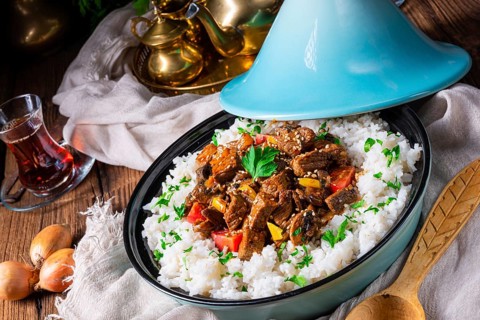 Tajin beef stew with rice, peppers and sesame seeds