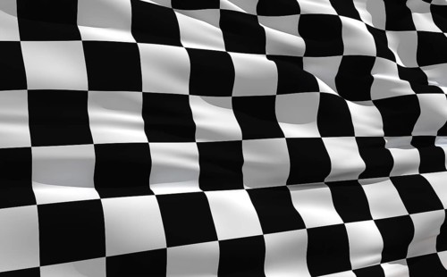 Fluttering checkered flag on the wind
