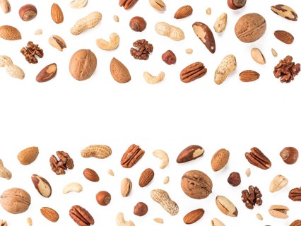 Pattern of nuts mix with copy space. Various nuts isolated on white. Pecan, macadamia, brazil nut,