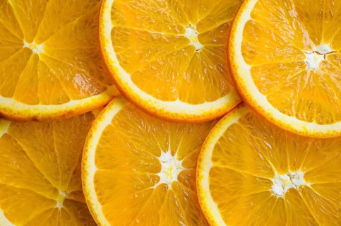 Slices of orange or tangerine isolated on white background
