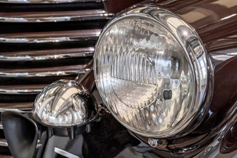 Headlight of old vintage car close-up