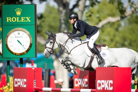 Irish rider Darragh Kenny riding VDL Cartello competes in the second round and jumpoff of the CPKC
