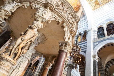 Pisa, Italy, 29 June 2023. Cathedral interior. The pulpit, Medieval art masterpiece by sculptor