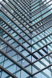 A full frame modern office architecture abstract with geometric angular reflected shapes and lines