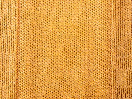 Orange knitted Jersey as a textile background