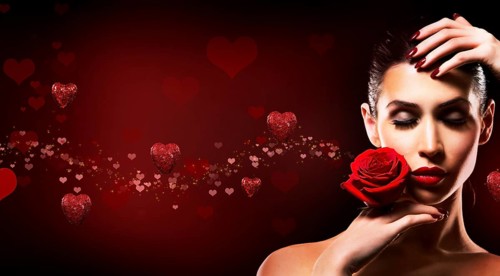 Beautiful woman with dramatic makeup and red lips. Red flower rose. Hearts in the background,