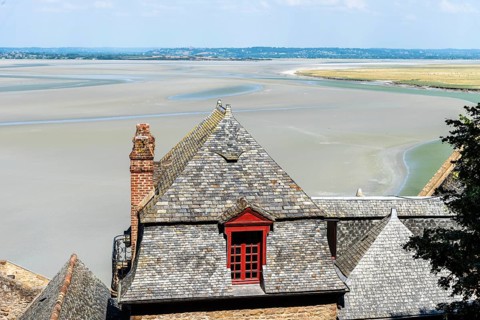 Mont Saint Michel, France, July 25, 2018: Scenic view of the bay at low tide, Europe