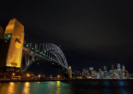 Famous sydney harbour bridge and CBD skyline landmarks in australia at night