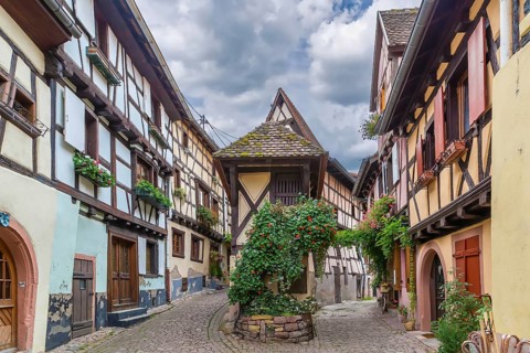 Picturesque historical street in Eguisheim, Alsace, France, Europe