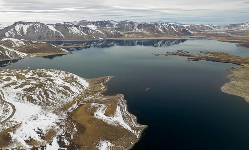 Aerial view of the Snowy Andes and Maule Lagoon at the Pehuenche border crossing between Chile and