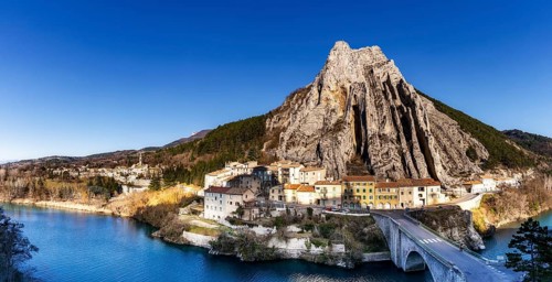 Sisteron, France, 6 March, 2023: panorama view of the village of Sisteron and the Rocher de la