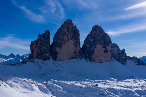 Tre Cime Di Lavaredo. The Three Peaks on Sunny Day in Winter. Aerial View. Sexten Dolomites, South