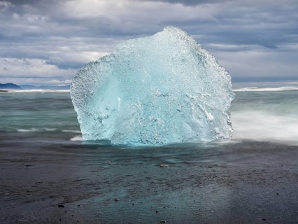 Diamond Beach, iceberg on black lava beach, near Jökulsarlon glacier lagoon, Vatnajökull National