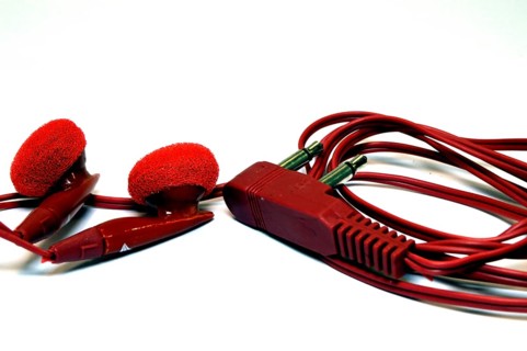 Earphones of red color for portable devices