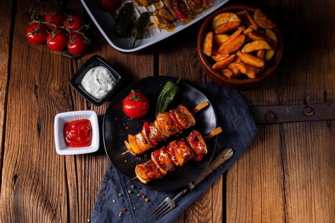 Marinated kebabs with meat and vegetables