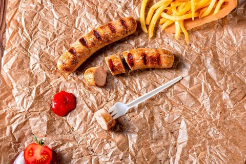 Rustic bratwurst with pommes and hot ketchup