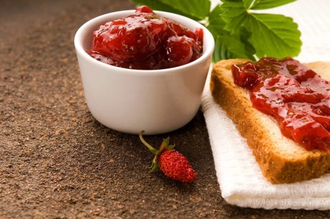 Wild strawberry jam with toast, poland