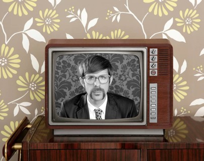 Nerd retro 60s vintage tv presenter hero on wood television wallpaper