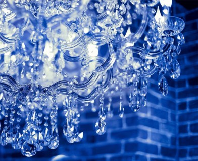 Chrystal chandelier close up. Glamour background with copy space