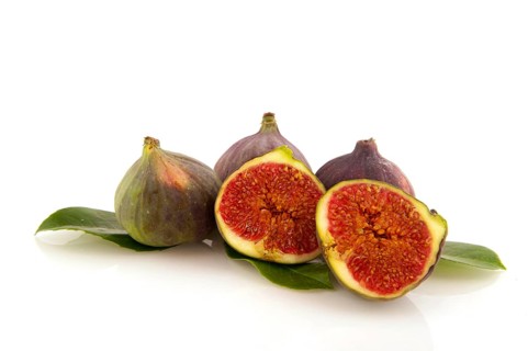 Figs fruit in the studio isolated over white