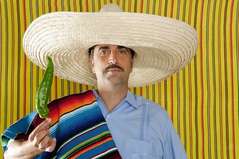 Chili hot pepper Mexican man typical poncho serape Mexico