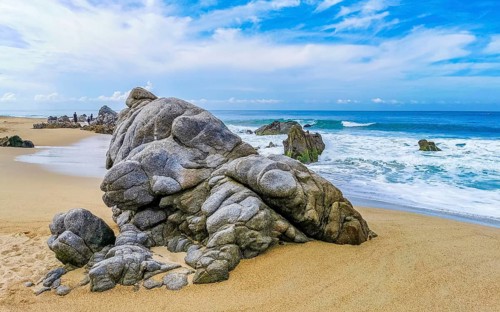Extremely beautiful huge big surfer waves on the beach in Zicatela Puerto Escondido Oaxaca Mexico